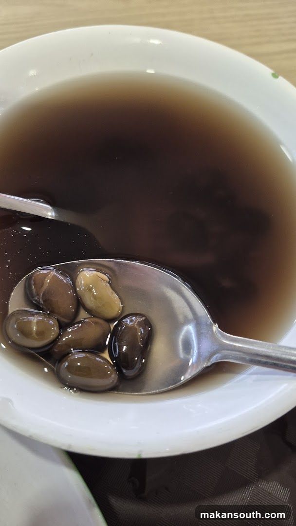 Bowl of Dark Soup with Beans