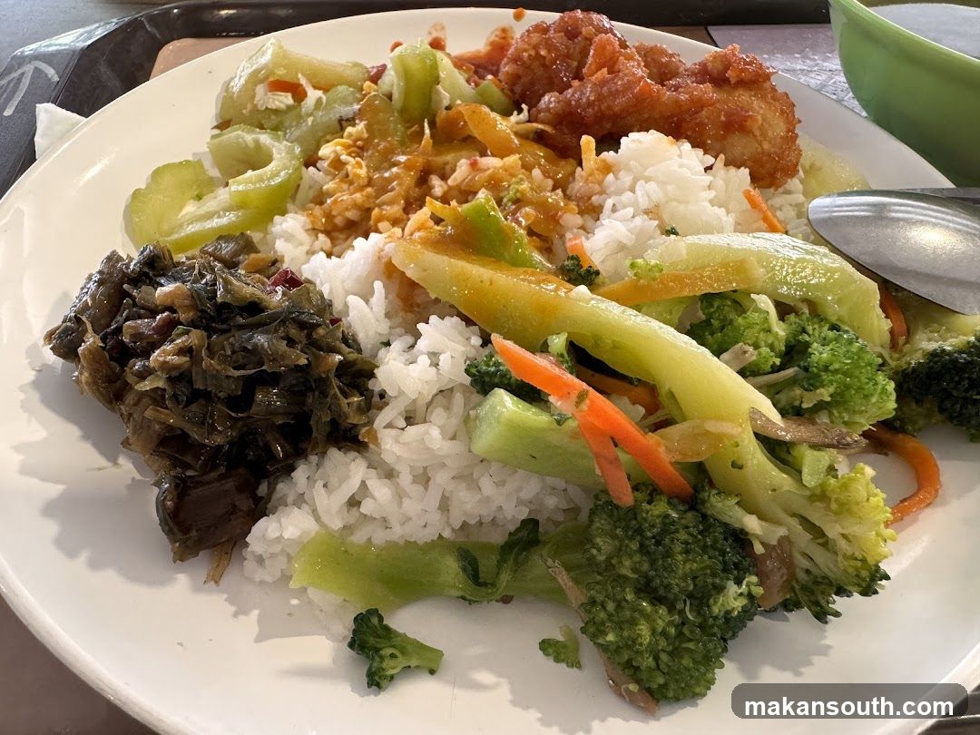 Plate of Fried Rice with Vegetables and Chicken