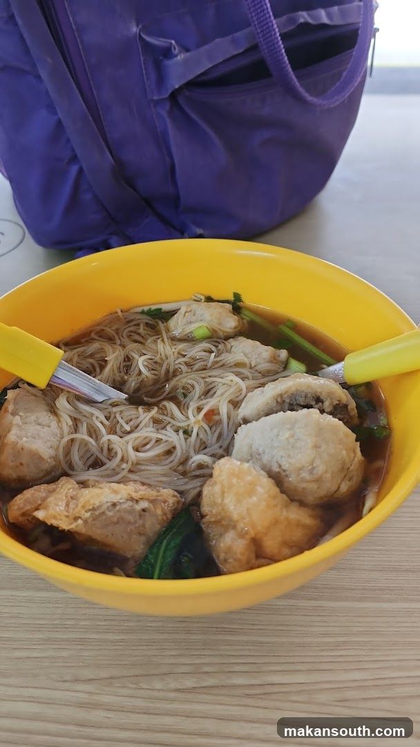 Bowl of Noodle Soup with Meatballs