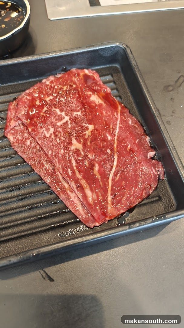 Raw Beef Slices on Grill Tray