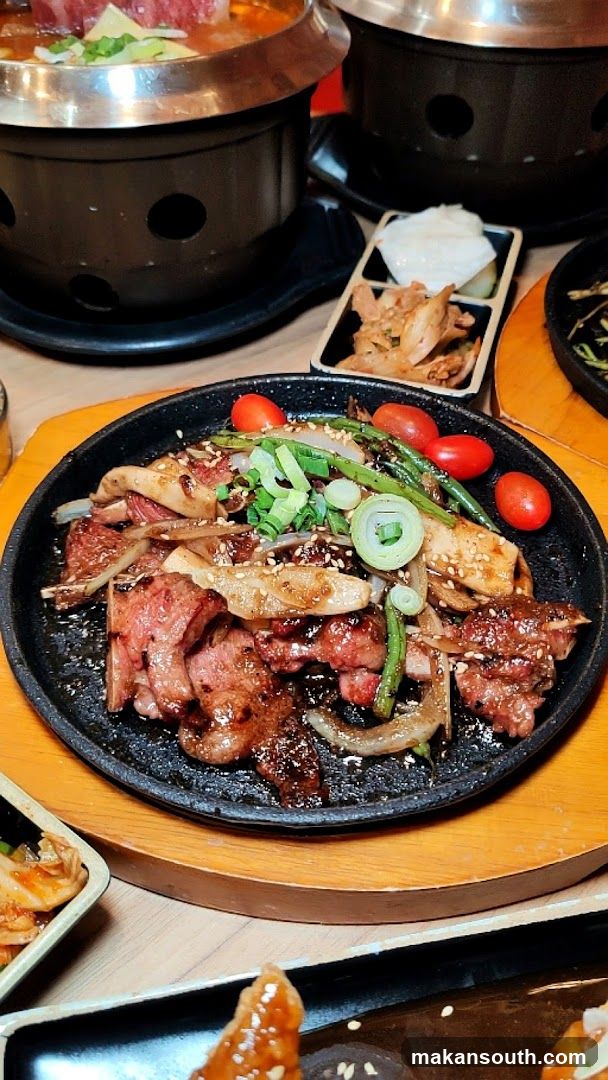 Sizzling Korean BBQ with Side Dishes