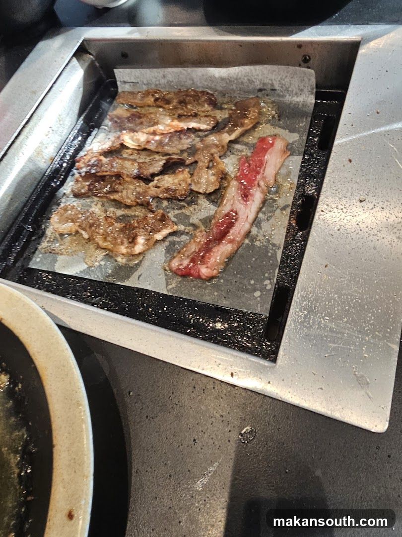 Grilled Meat on Hot Plate