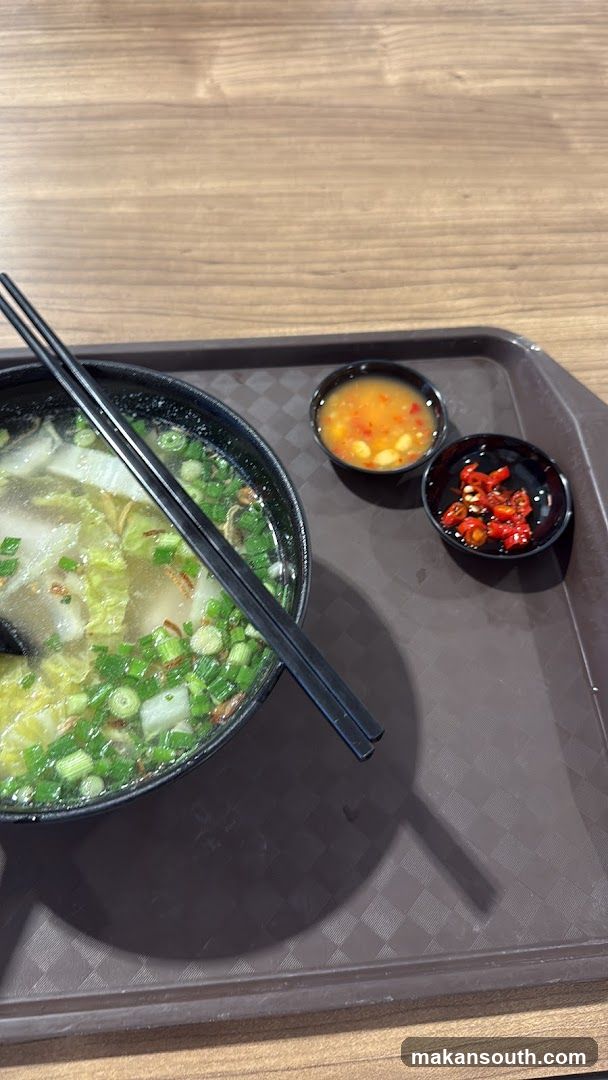 Bowl of Soup with Condiments