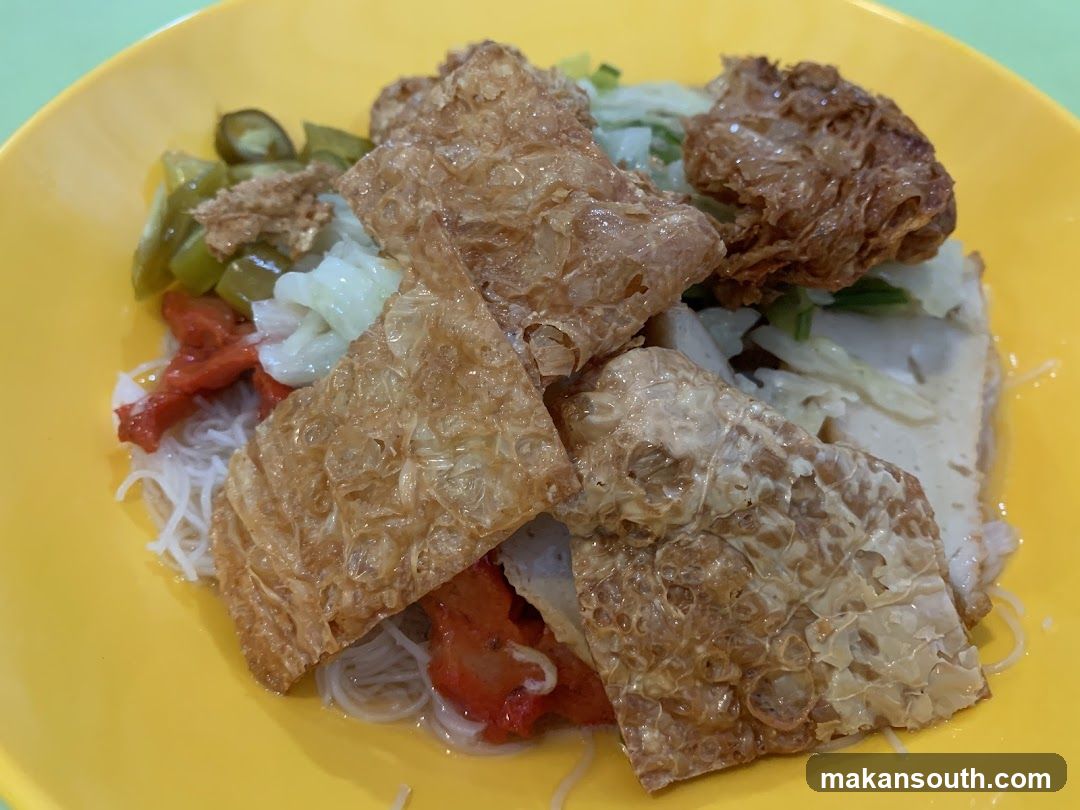 Noodle Dish with Fried Tofu and Pickles
