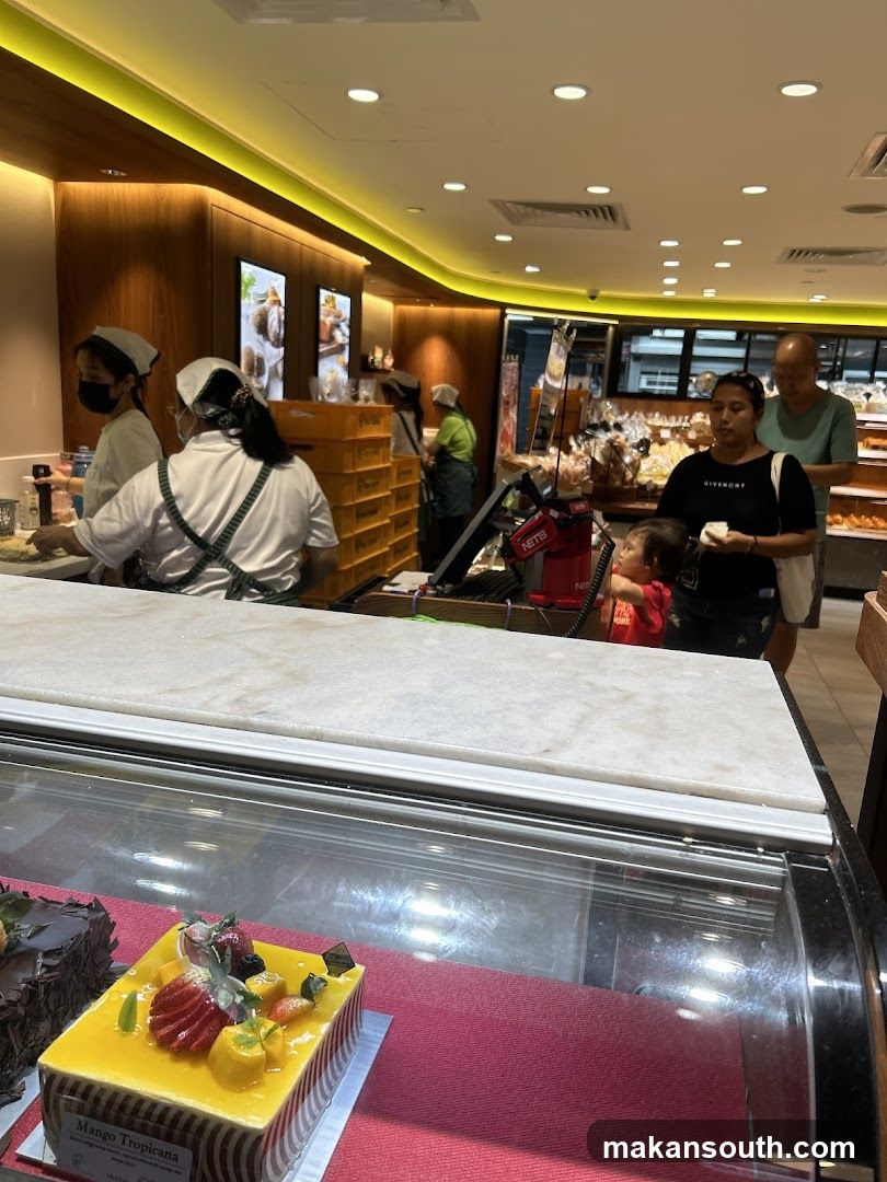 Bakery Interior with Staff and Customers