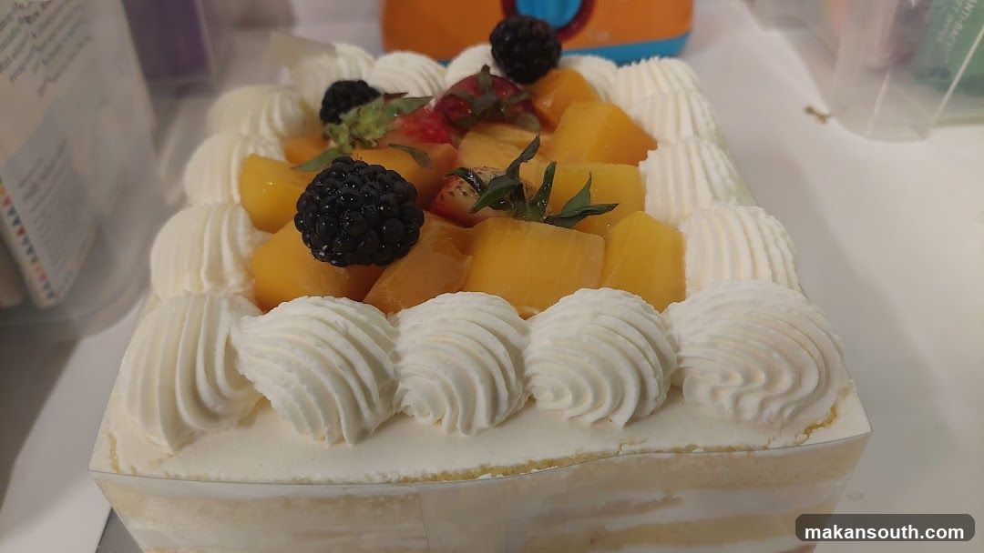 Fruit Cake with Cream and Berries