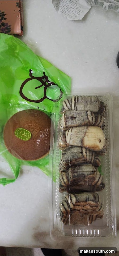 Baked Goods and Cake on Table
