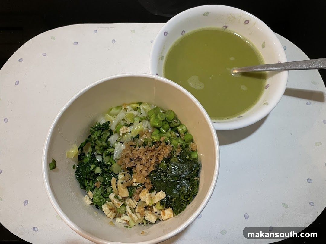 Bowl of greens with soup