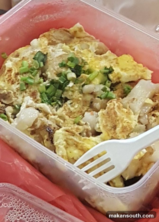 Takeout Container with Fried Rice and Egg