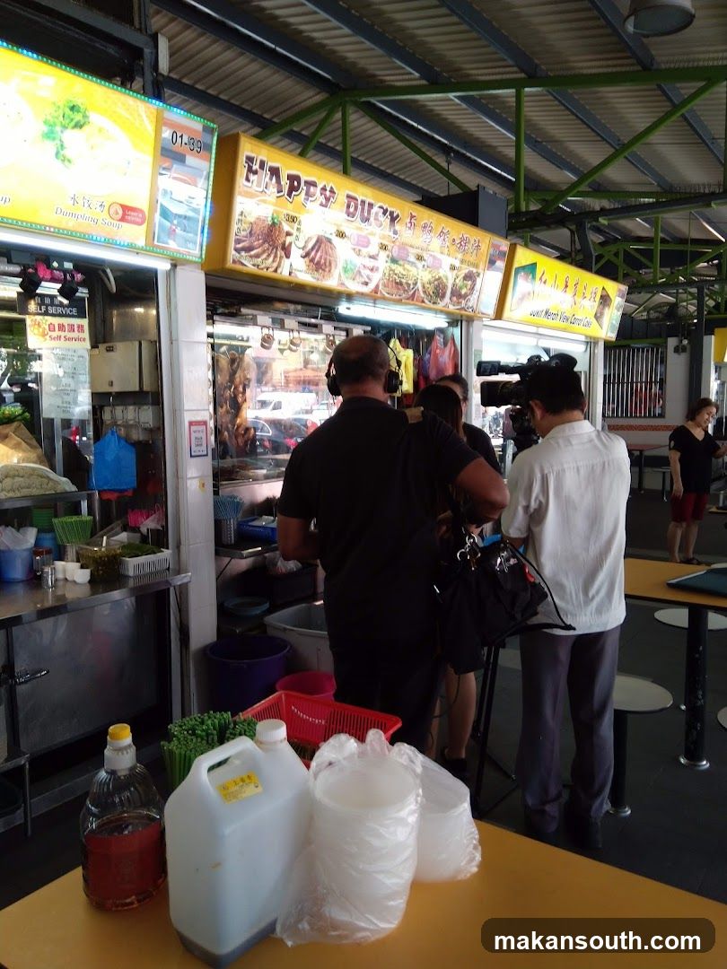 Food Stall Scene with Staff and Equipment