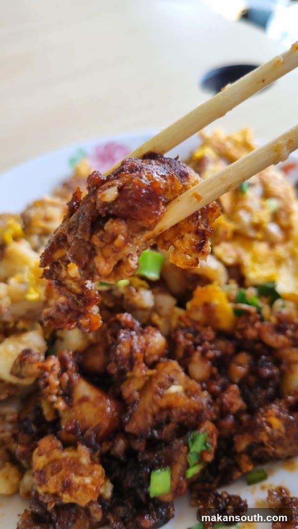 Close-up of Fried Rice with Chopsticks