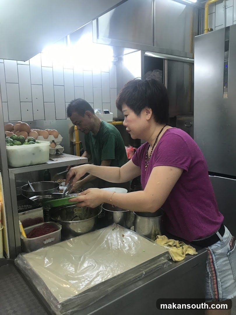 Kitchen Staff Preparing Food
