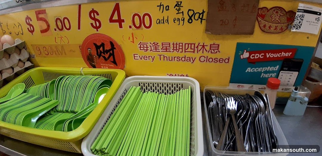 Food Shop Display with Utensils and Signage