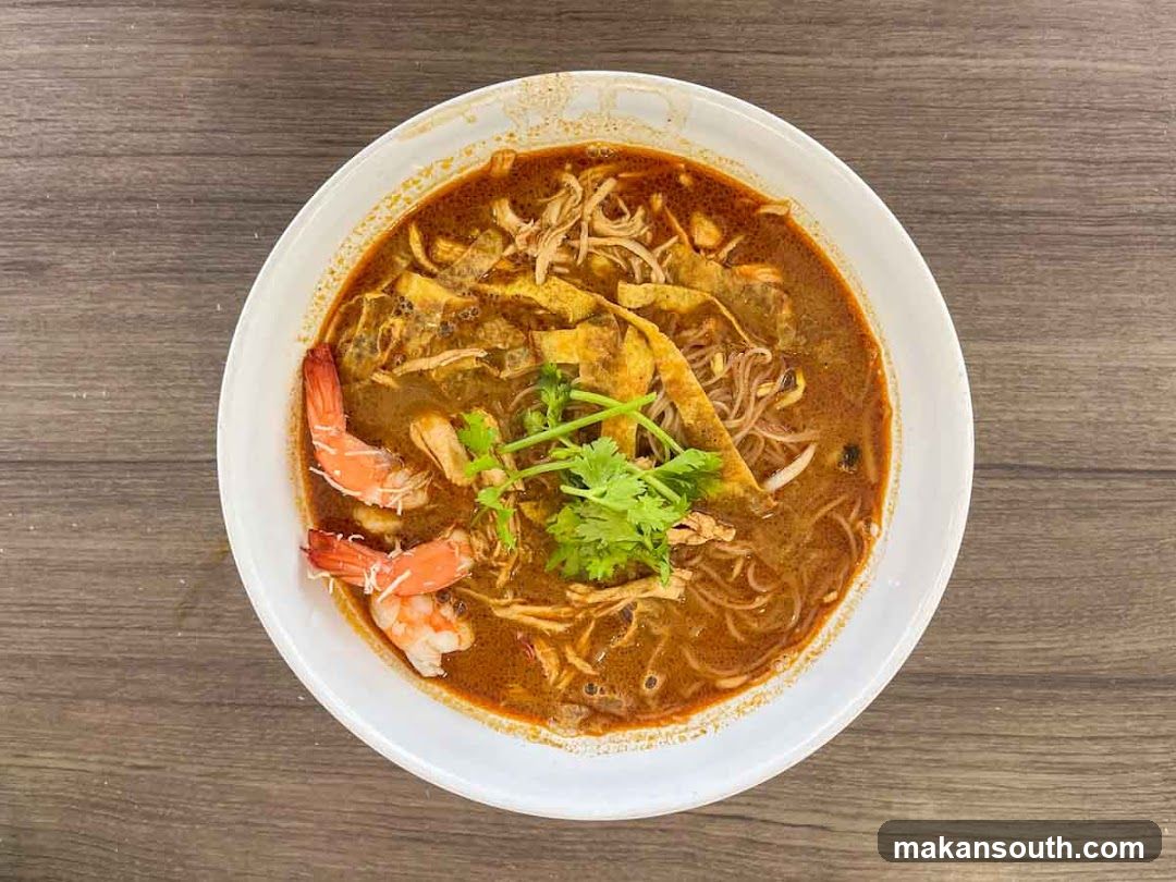 Bowl of Curry Noodle Soup with Shrimp