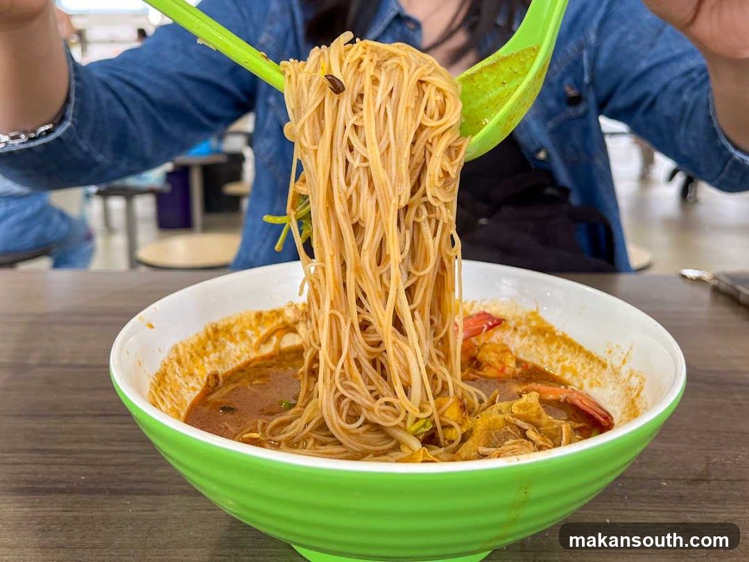 Noodle Bowl with Green Utensils