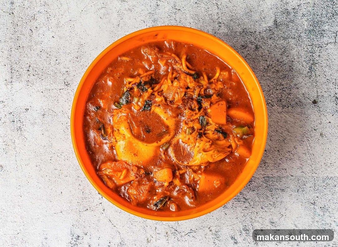 Bowl of Korean-style stew with vegetables and meat