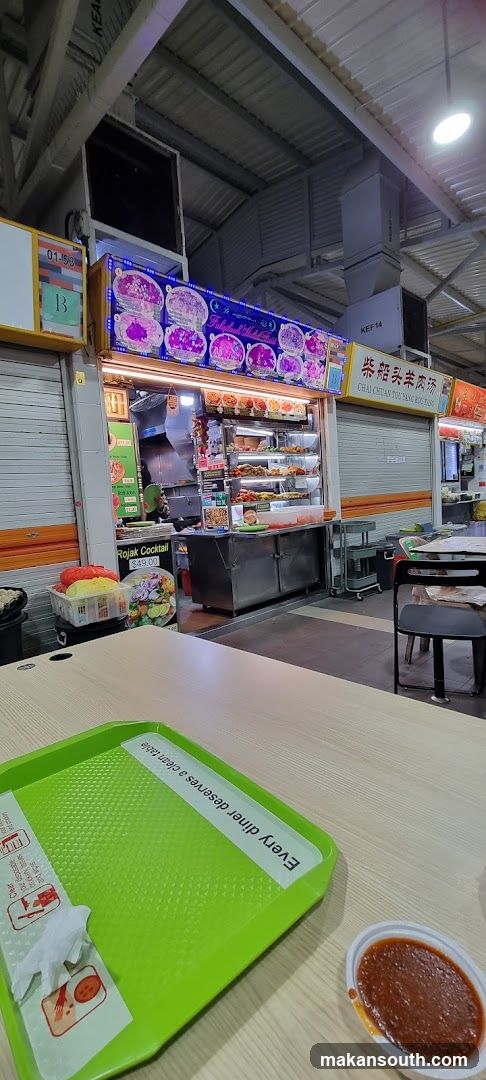 Food stall interior with tray and sauce