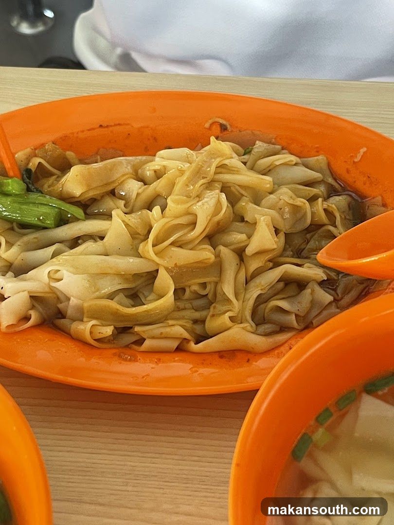Noodle Dish in Orange Bowl