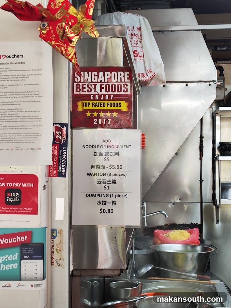 Food Stall Interior with Signage and Menu Board