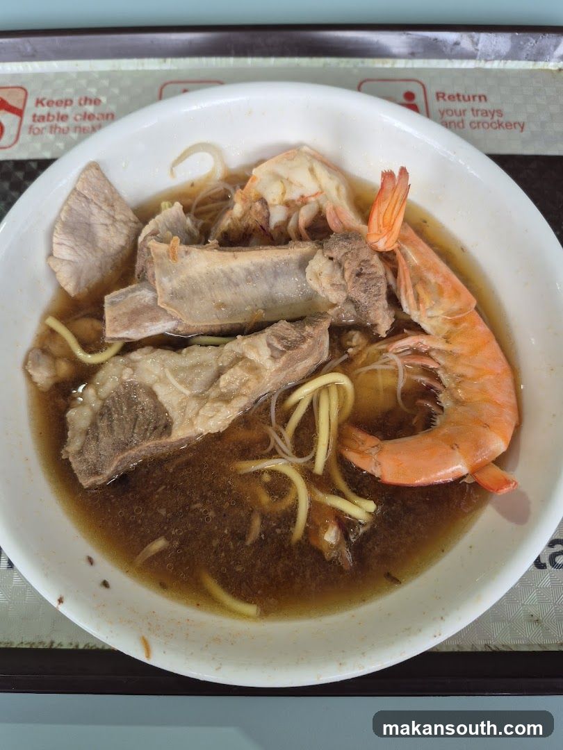 Bowl of Noodle Soup with Shrimp and Meat