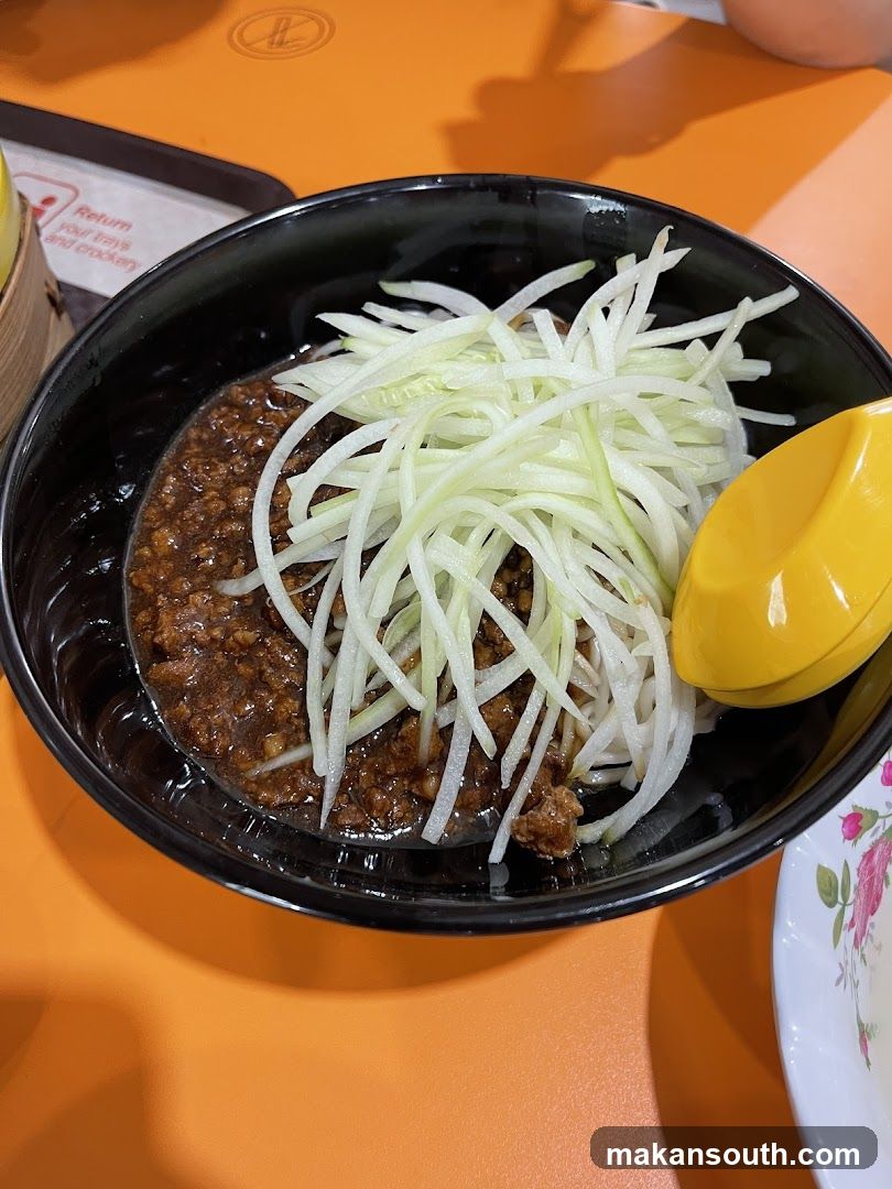 Bowl of noodles with toppings