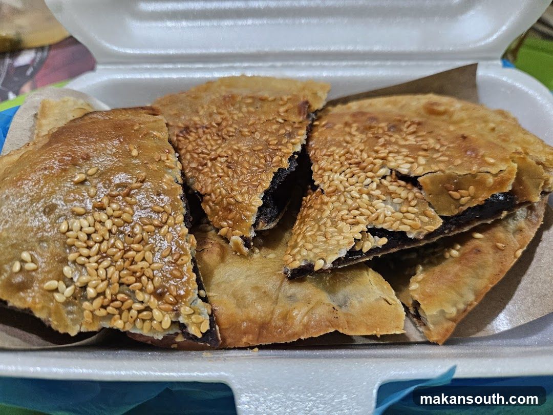 Sesame Seed Pastry in Takeout Container
