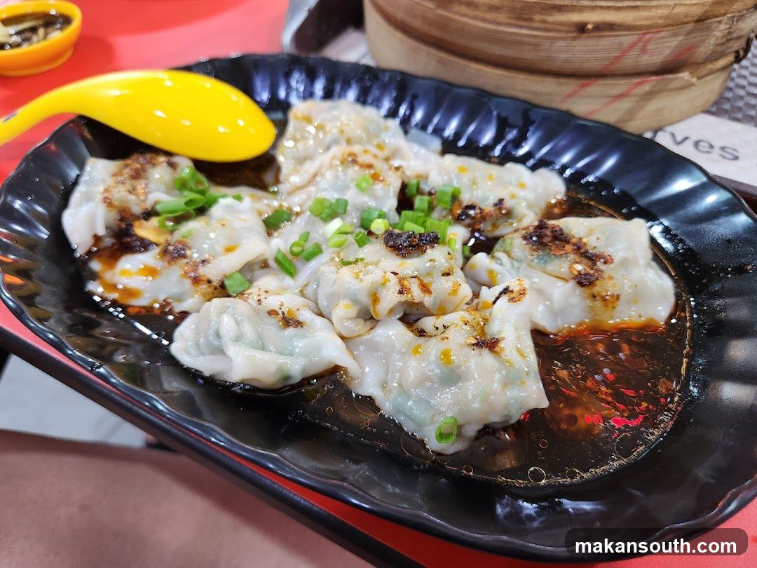 Pan-fried Dumplings with Sauce and Scallions