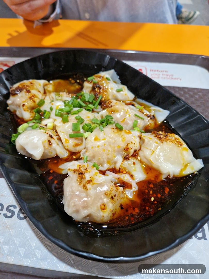 Dumplings with Chili Oil and Scallions