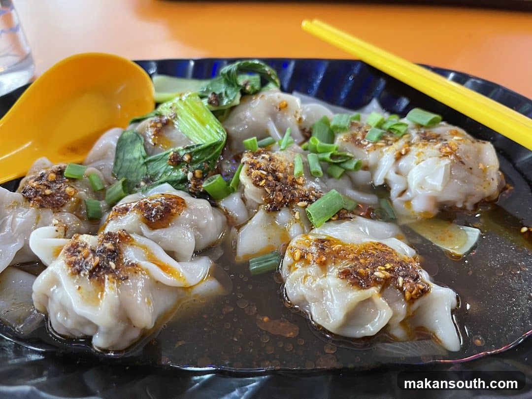 Dumplings with Chili Oil and Greens