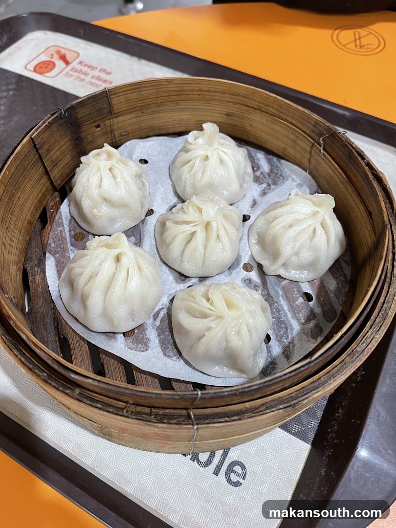 Steamed Dumplings in Bamboo Basket