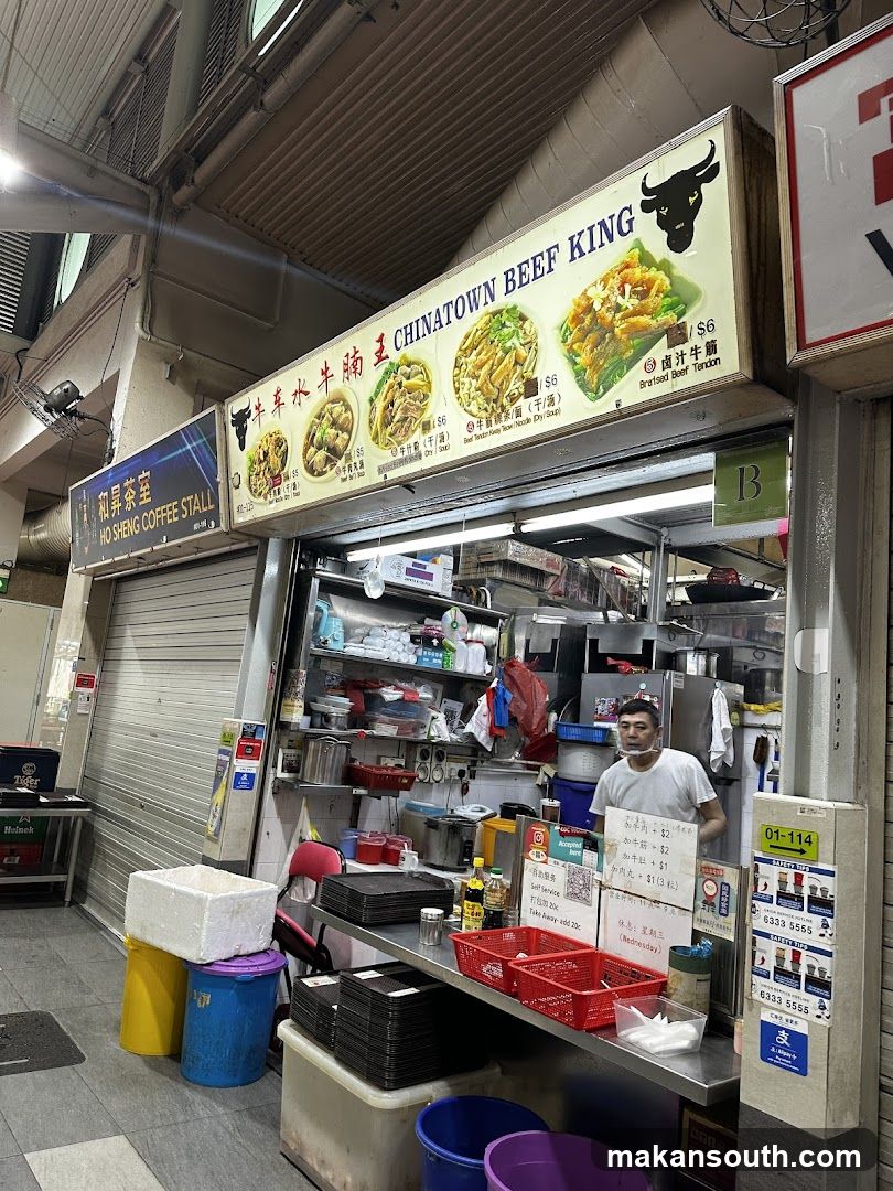 Food Stall Interior with Staff and Equipment