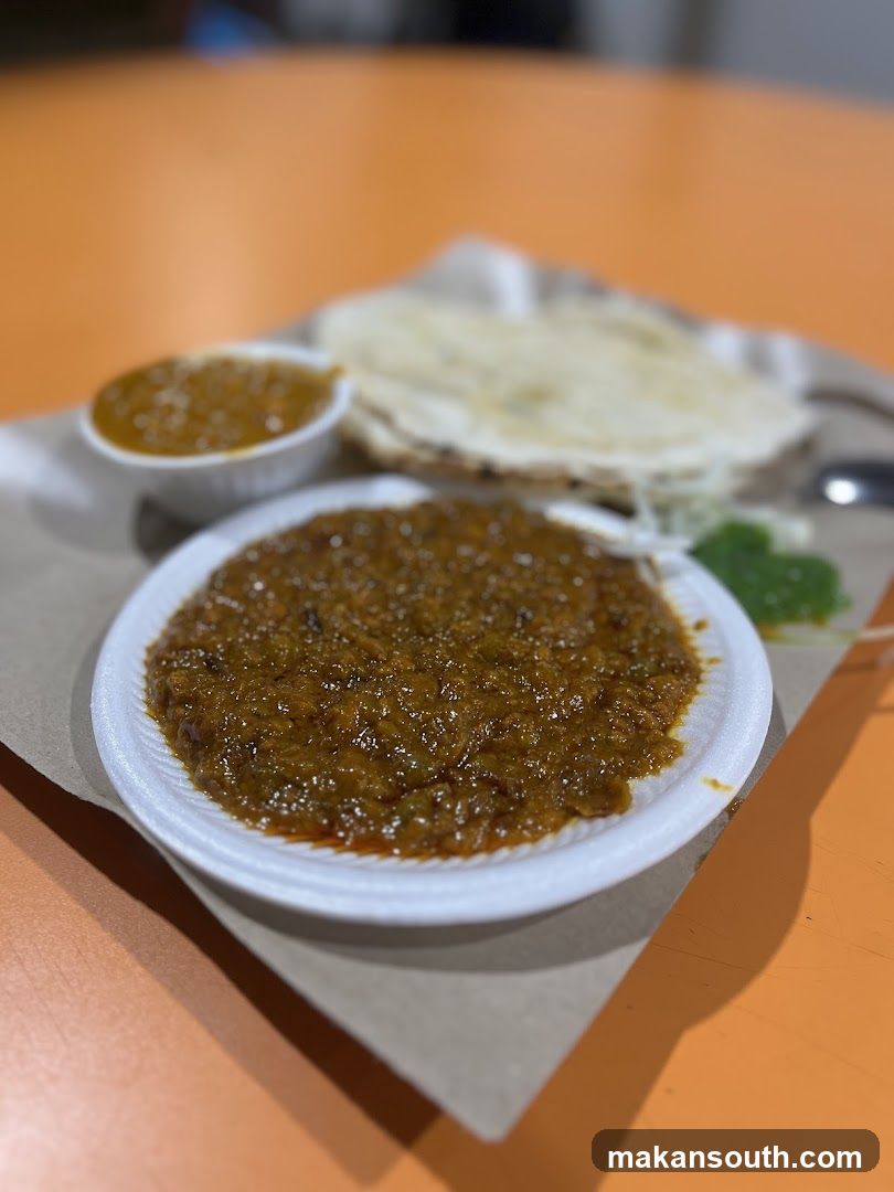 Food Plate with Curry and Flatbread