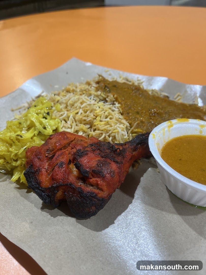 Chicken Curry Plate with Rice and Papaya Salad
