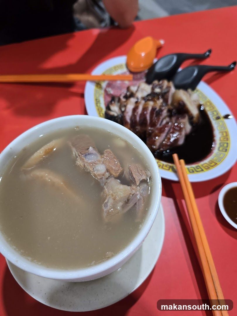Dish with soup and roasted meat