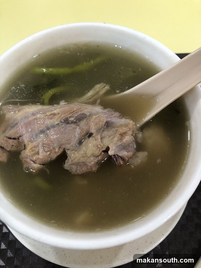 Bowl of Soup with Meat and Vegetables