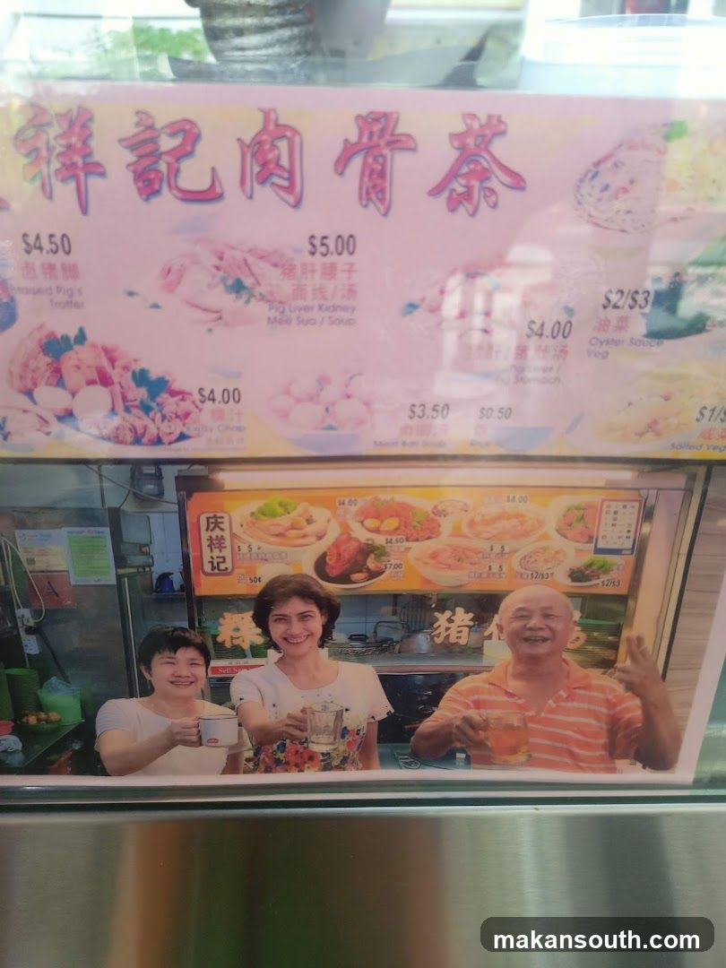 Food stall with staff and menu display