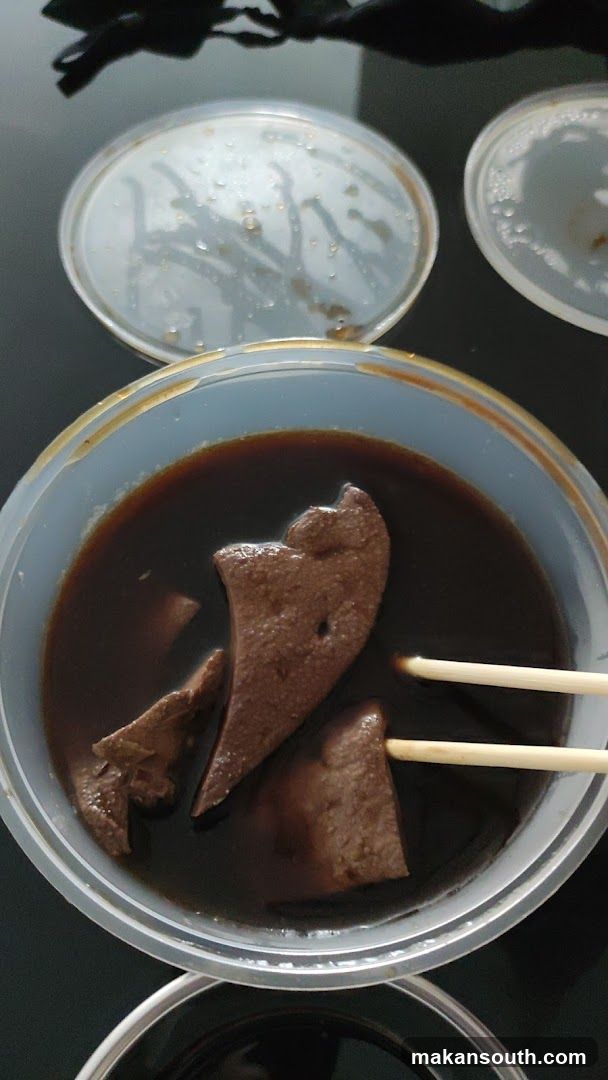 Bowl of Dark Soup with Liver