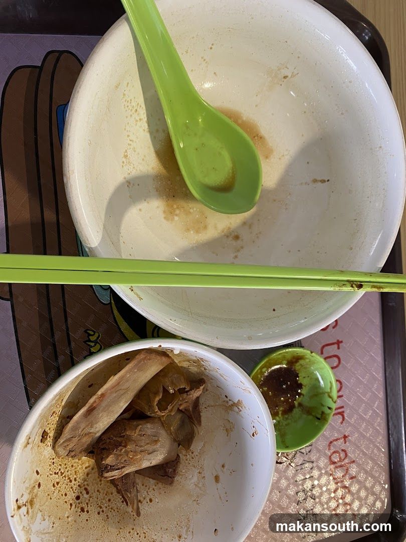 Empty Bowls with Remnants of Food