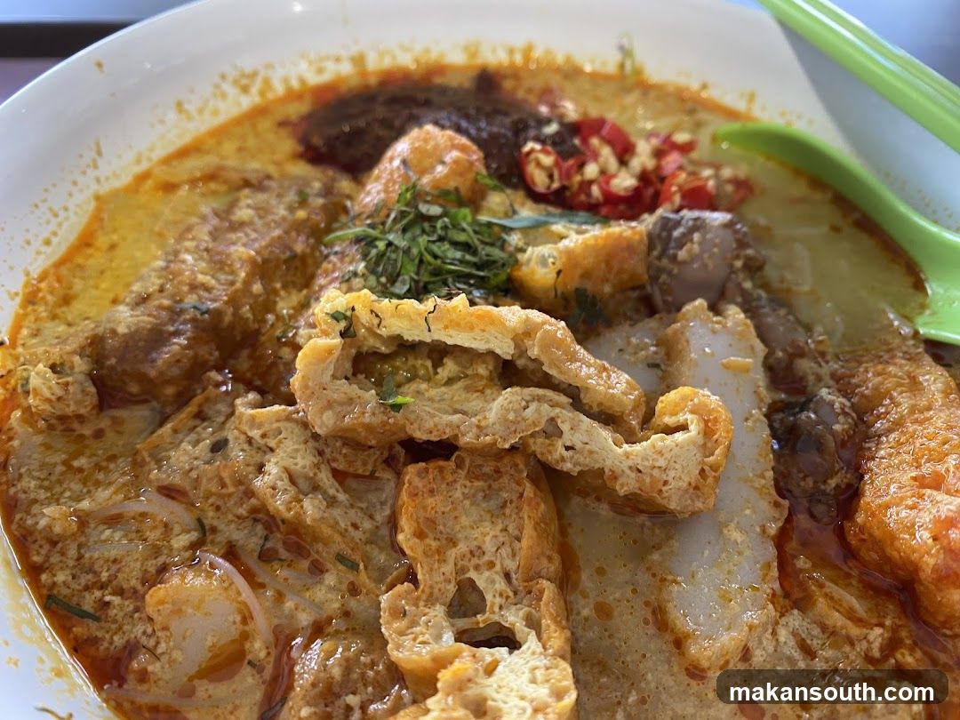 Spicy Curry Noodle Dish with Tofu and Chilies
