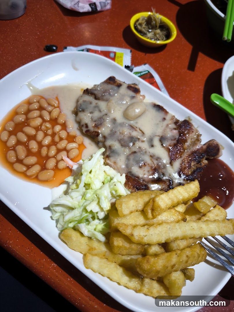 Plate of Food with Steak, Fries, and Beans