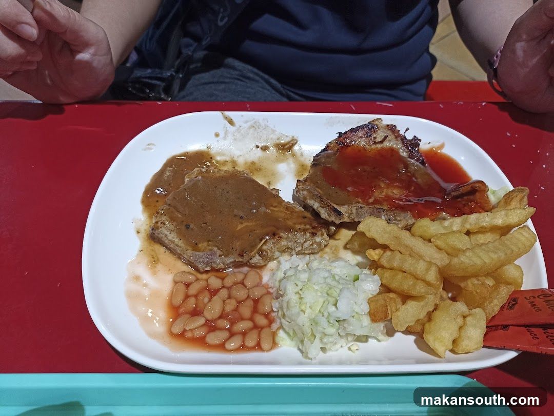 Plate of Food with Meat and Sides