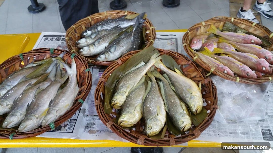 Fresh Fish Display at Market Stall