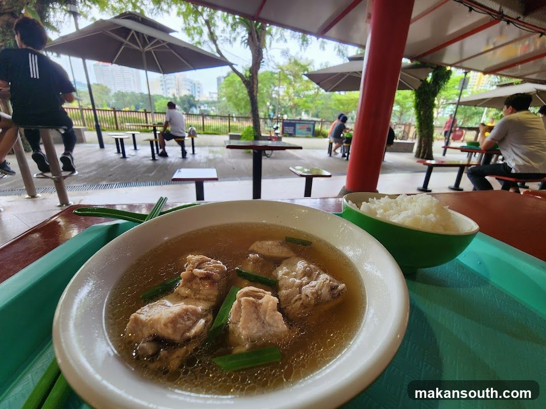 Outdoor Dining Scene with Soup and Rice