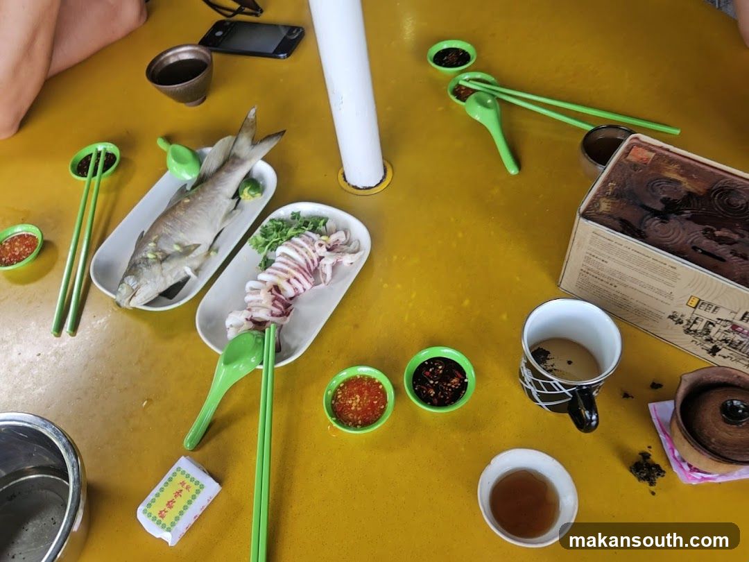 Dining Table with Seafood and Condiments
