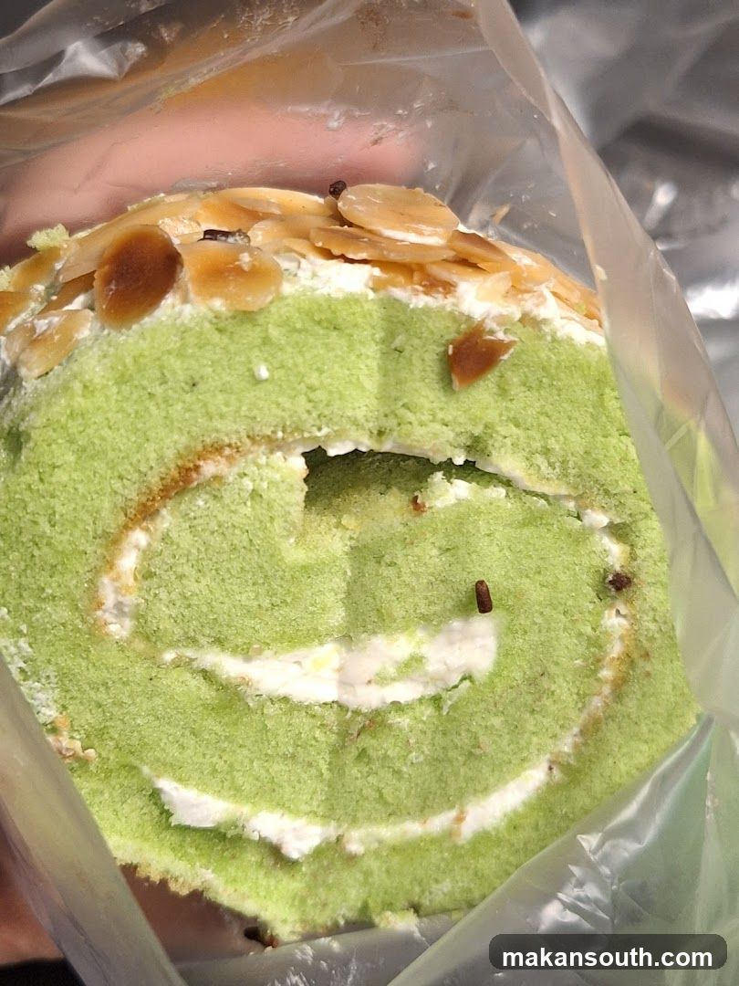 Green Matcha Roll Cake with Almond Topping