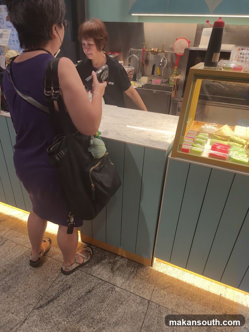 Customer at a food counter