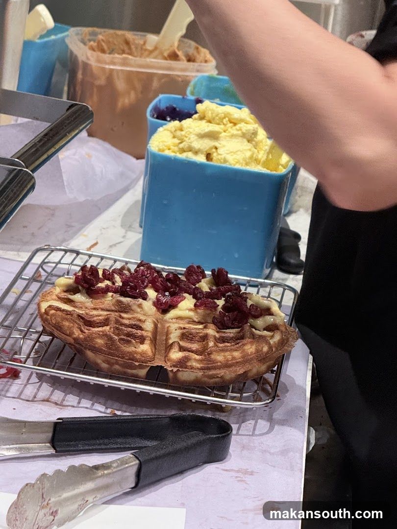 Waffle with toppings being prepared