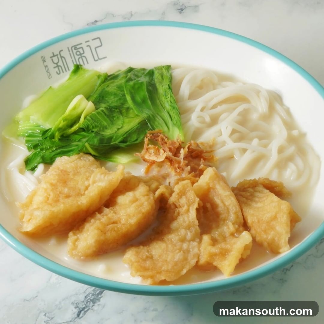 Bowl of noodles with toppings