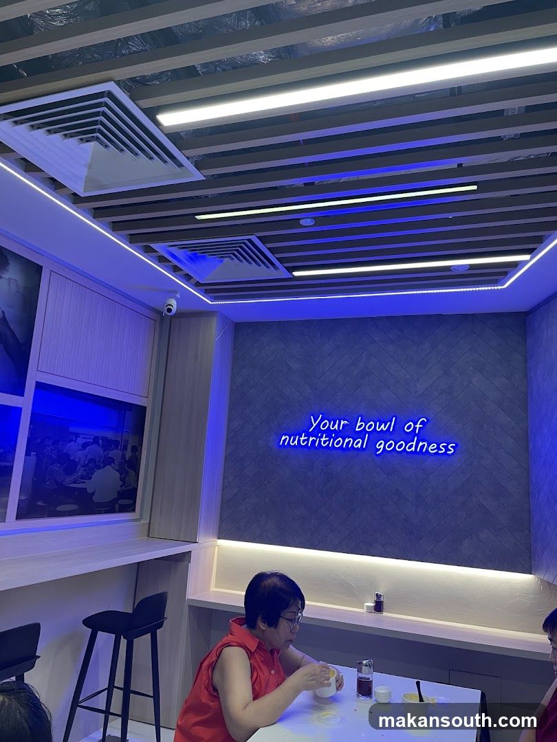 Interior of a modern eatery with blue lighting