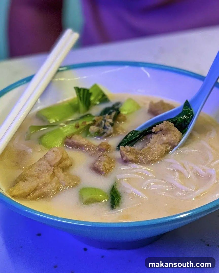 Bowl of Noodle Soup with Meat and Vegetables
